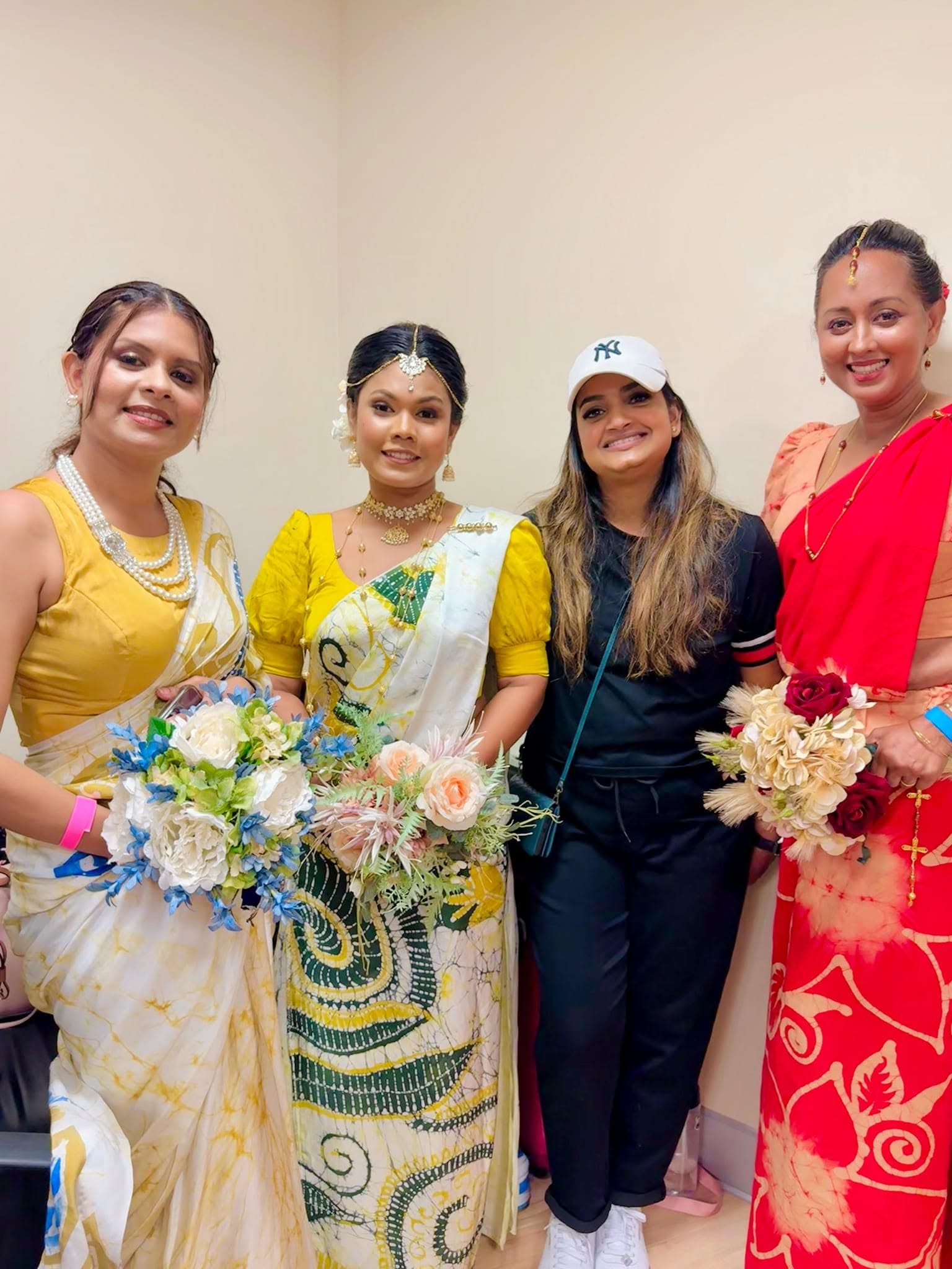 Omey Beauty bridal party in traditional sarees, styled for a wedding celebration